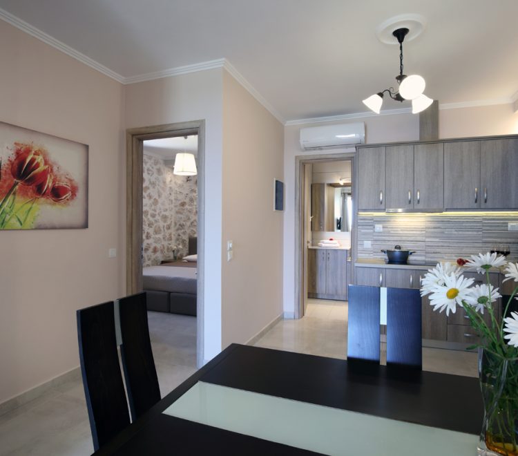 apartment-irida-tsoukalades-lefkada-dining-kitchen-and-bedroom-access