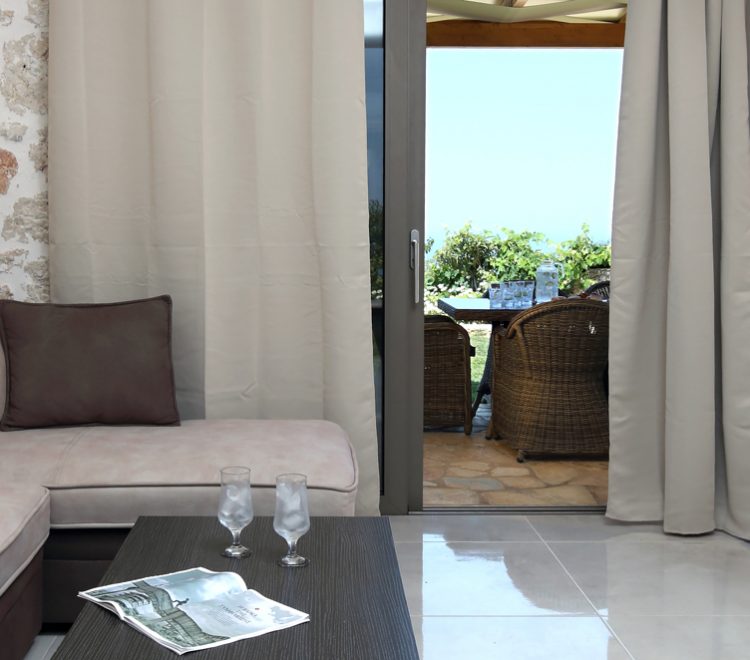 apartment-irida-tsoukalades-lefkada-lounge-area-with-balcony-access
